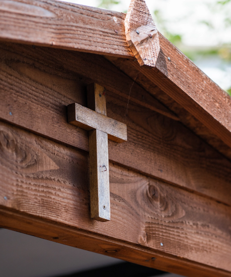 wooden cross on shed