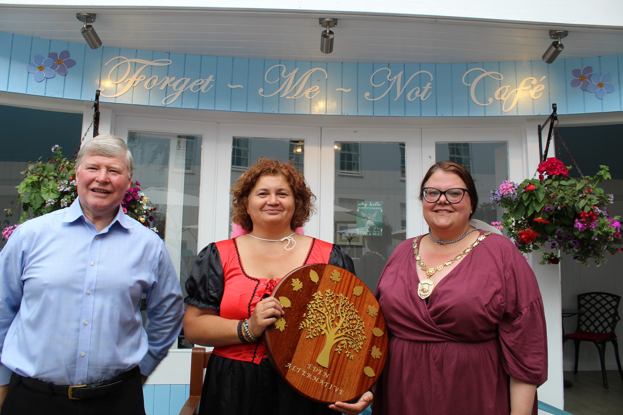 Devon care home manager with Eden Alternative award plaque