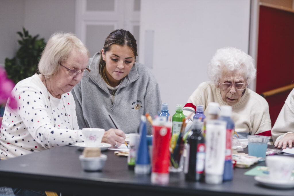 A resident at The Seaton enjoys some arts and crafts