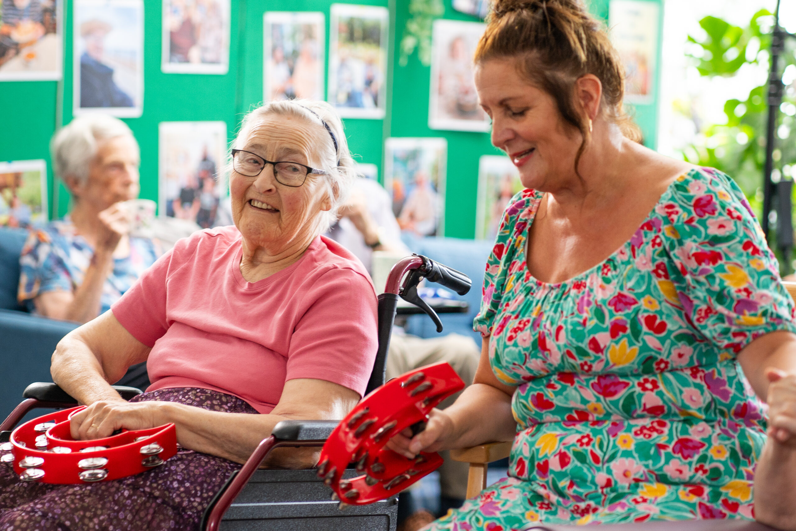 Sefton-Hall-resident-Shirley-Mapston-with-care-team-member-Julie-Yates in the lounge