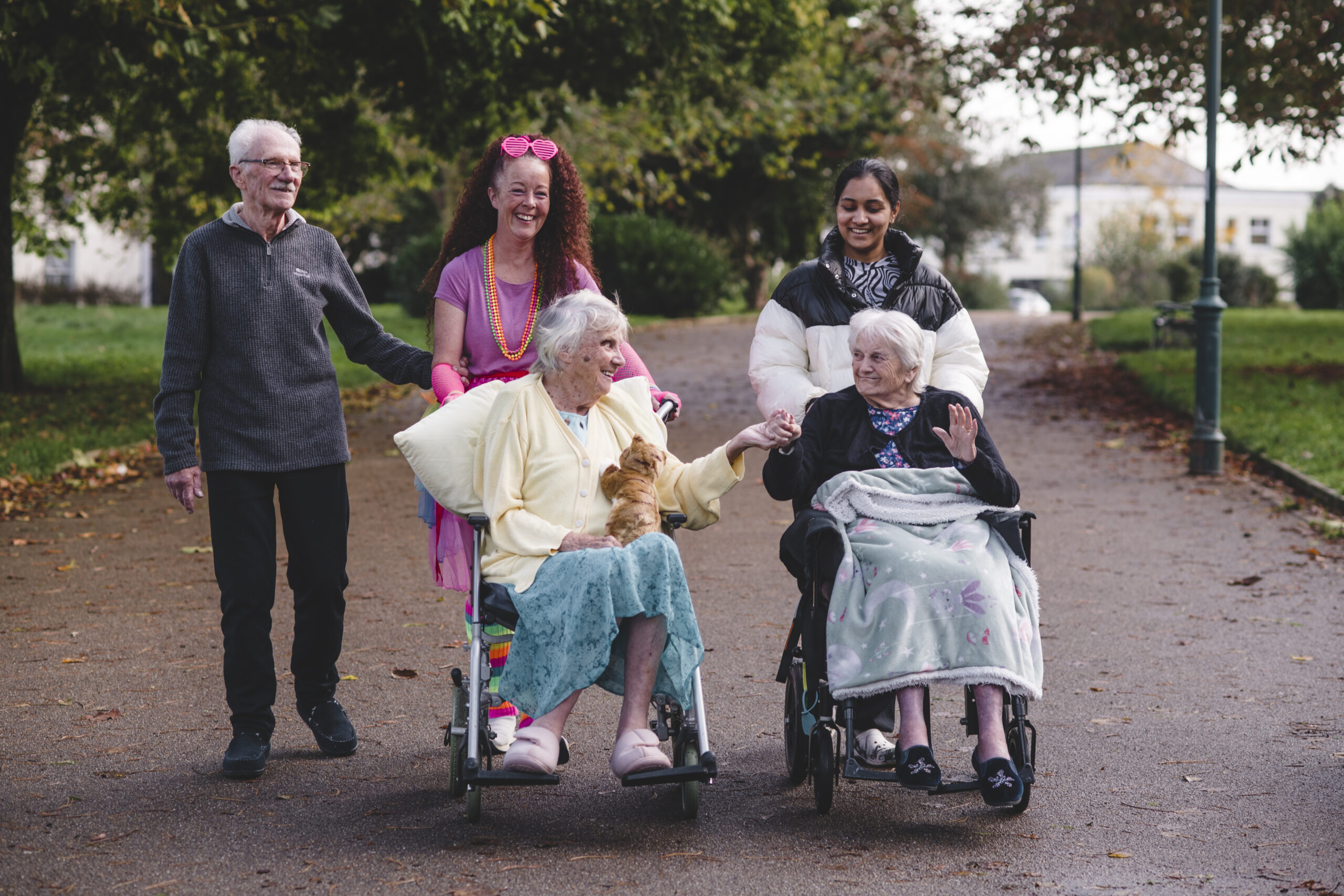 Parkwood House residents enjoy a trip to Devonport Park with members of the care team.