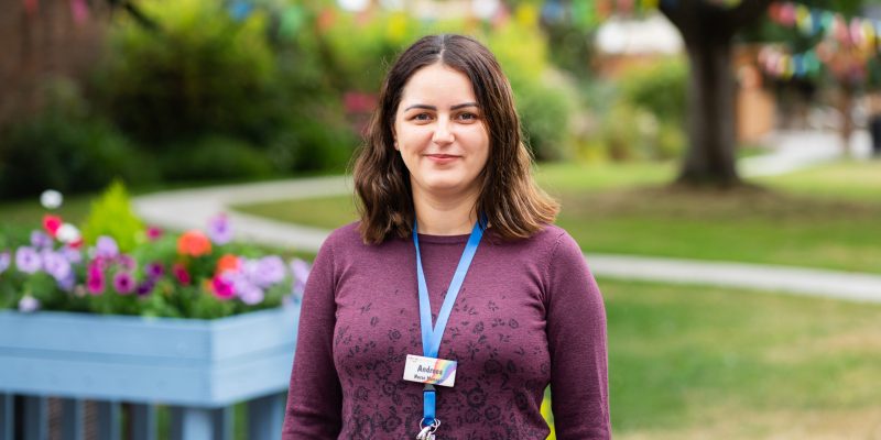 Andreea Vieru, a nurse manager at Sefton Hall care home in Dawlish standing in the garden