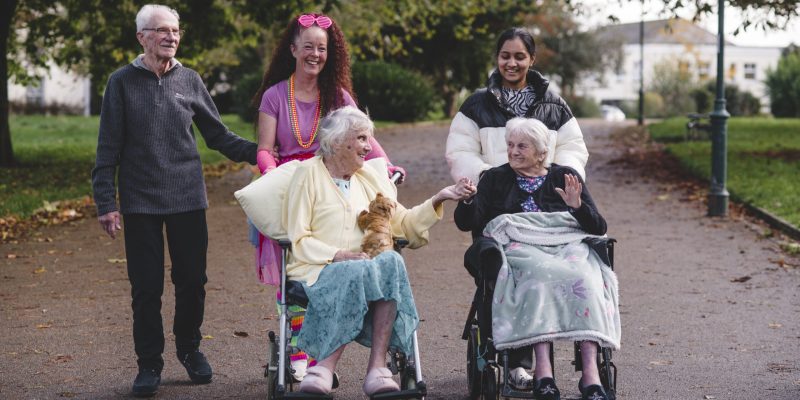 Parkwood House residents enjoy a trip to Devonport Park with members of the care team.