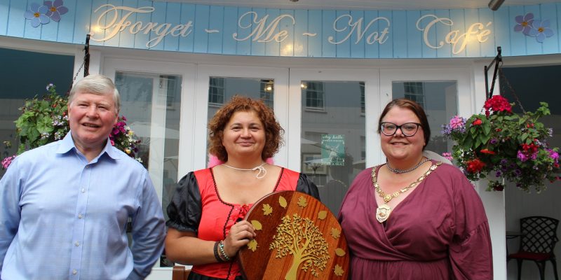 Devon care home manager with Eden Alternative award plaque